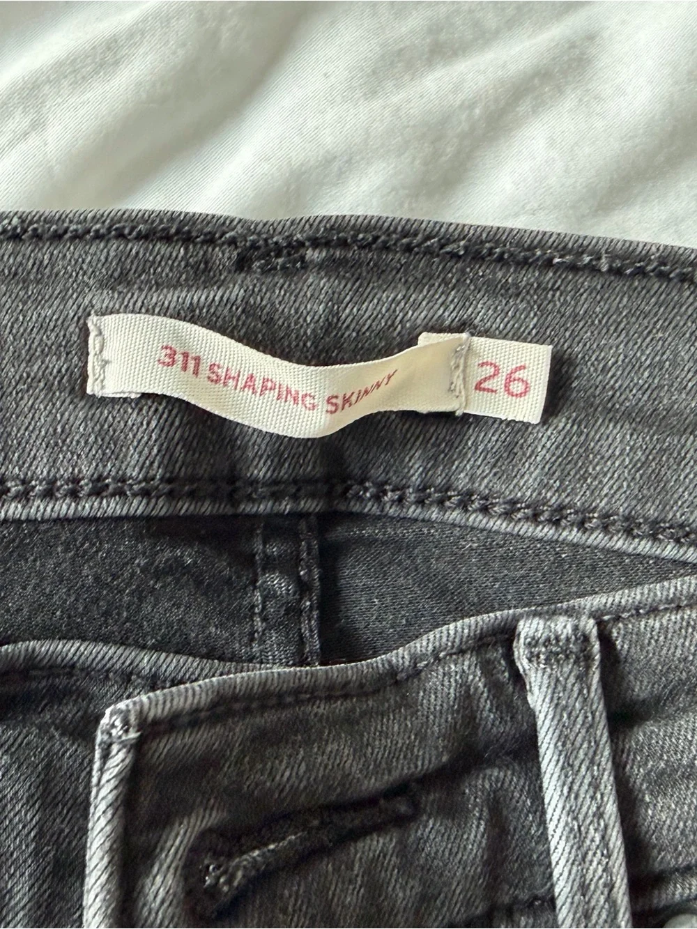 8 pairs of worn Levi black jeans - Size 26
